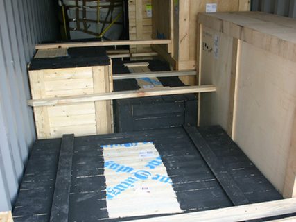 Crates braced inside a shipping container